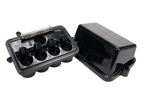Intermatic PJB4175 junction box with lid beside it, showing ground bar and cord hubs