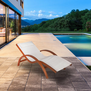 Island Retreat Bentwood Breeze Lounger - lounger on a poolside terrace at dusk