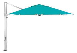 Ledge Lounger Pinnacle Umbrella — pinnacle cantilever umbrella shown open on a pool deck
