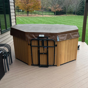 HeatWave Premium Cover Lift - lift fitted to an octagonal hot tub on a garden deck