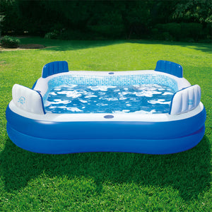 Blue Wave Premier Inflatable Pool - filled on a lawn showing the four moulded seats and backrests
