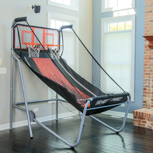 Hathaway Shot Pro Basketball Arcade - unit set up in a bright room beside a brick fireplace