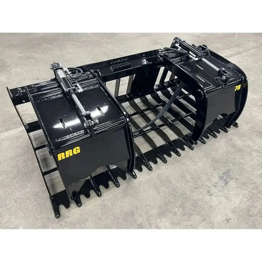 Root grapple vs brush grapple — Stinger root and rock grapple with open tines on a loader