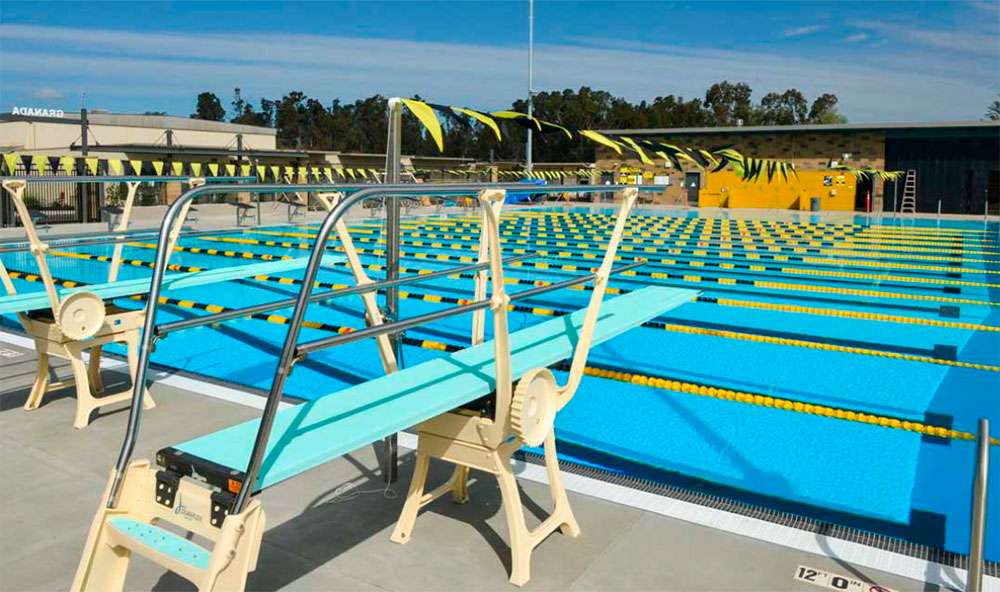 Duraflex one-meter diving stand 1M — installed at an outdoor competition pool