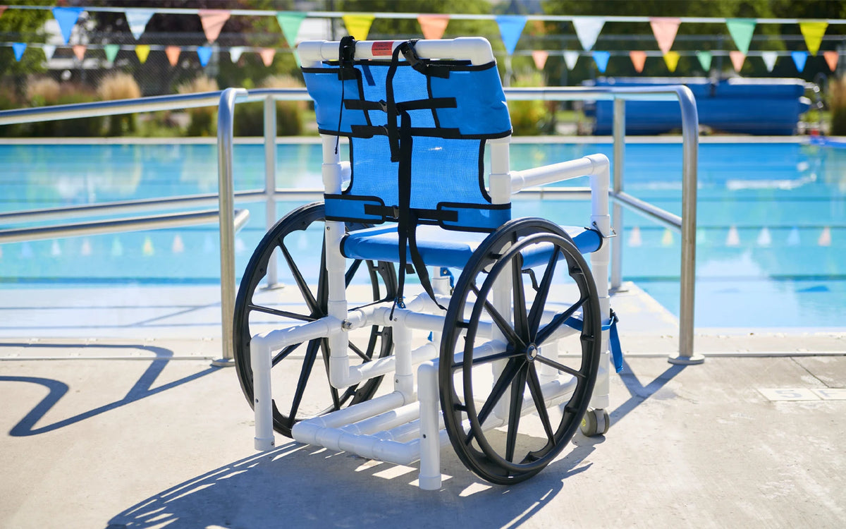 Aqua Creek PVC pool access chair — in use at a pool