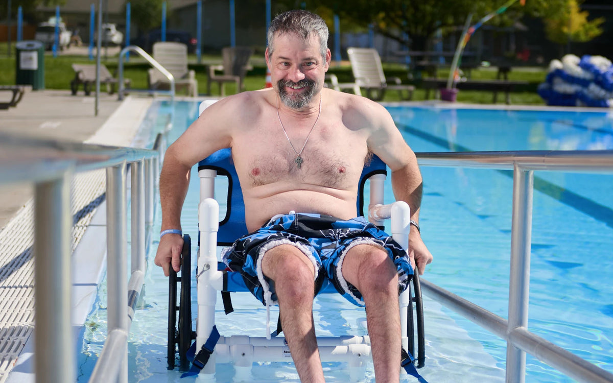 Aqua Creek PVC pool access chair — in use