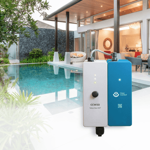Clear Comfort CCW50 AOP system shown with the residential pool it treats at up to 35 GPM