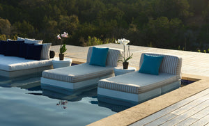 Ledge Lounger Affinity 2 Piece Sun Chair installed poolside with a side table