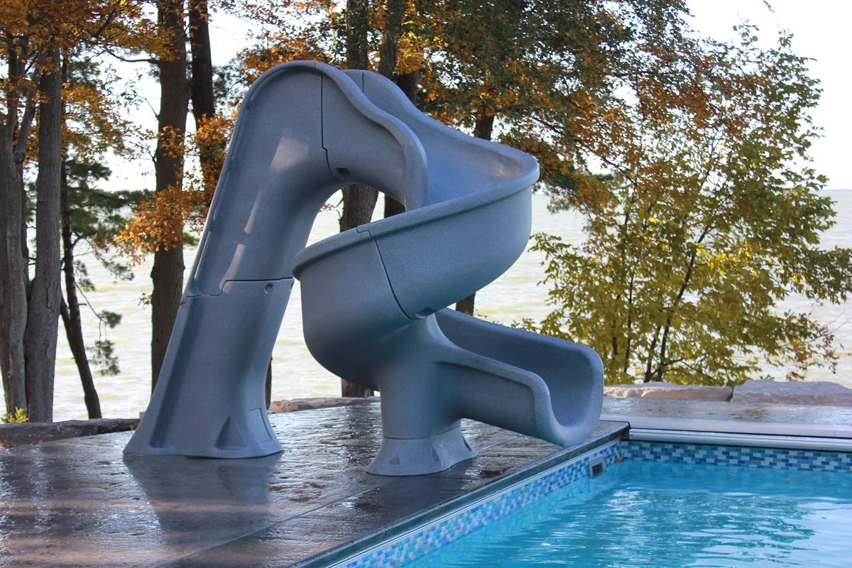 Global Pool Products Tsunami pool slide installed at a pool