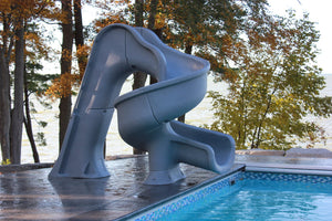 Global Pool Products Tsunami pool slide installed at a pool