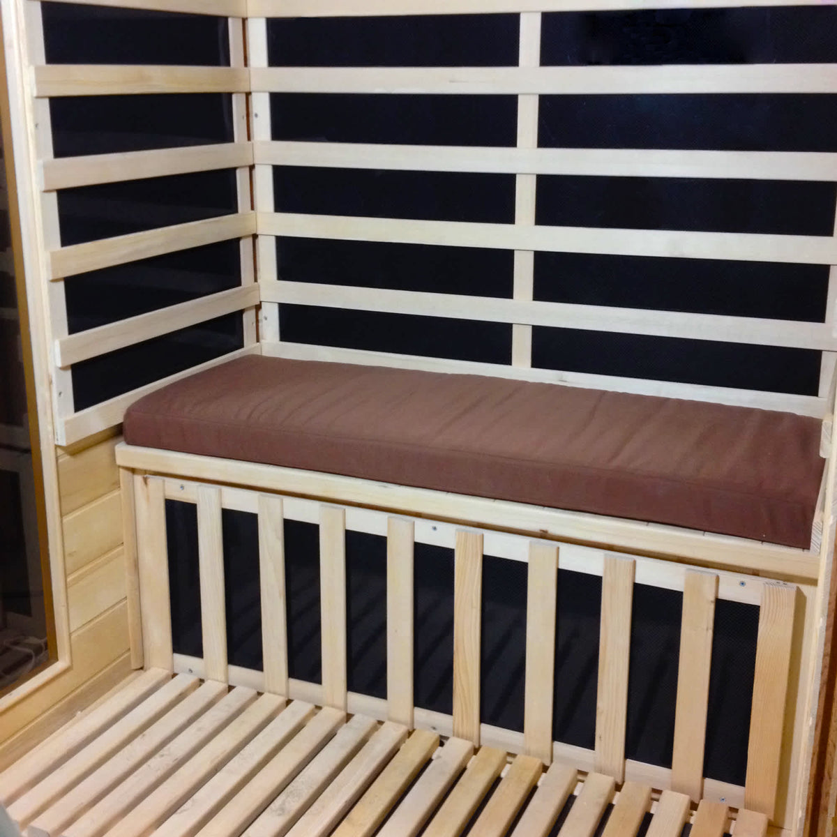 HeatWave Sauna Seat Cushion, Brown - cushion laid along the bench inside a two-person cabin