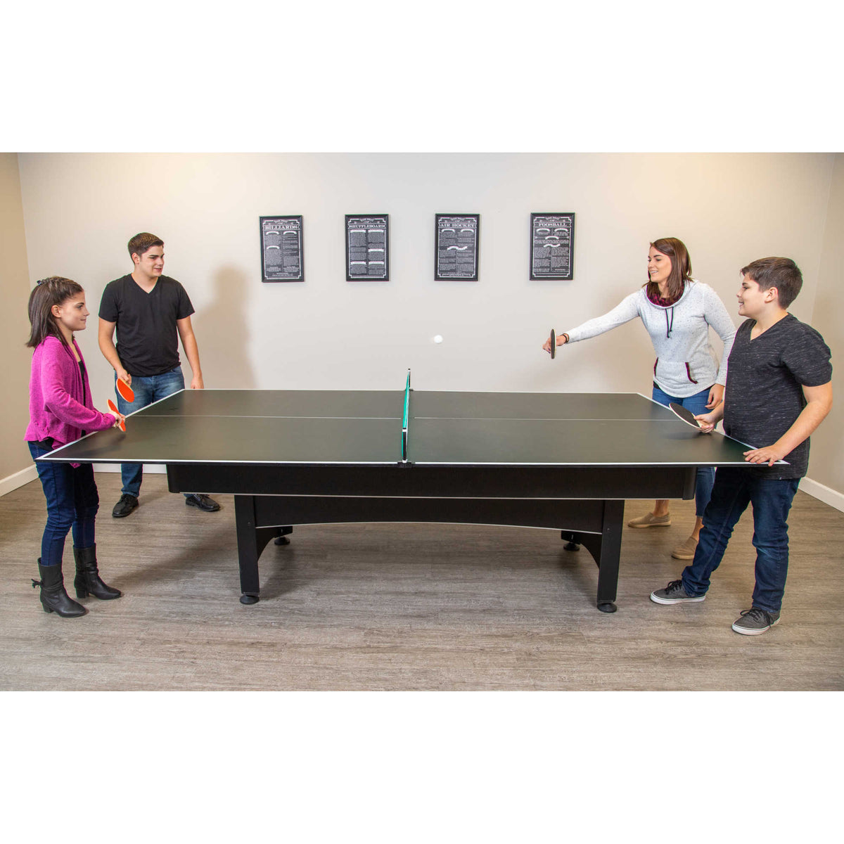 Hathaway Quick Set Table Tennis Conversion Top - four players in a doubles rally on the fitted top
