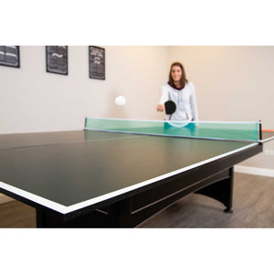 Hathaway Quick Set Table Tennis Conversion Top - player serving across the fitted top