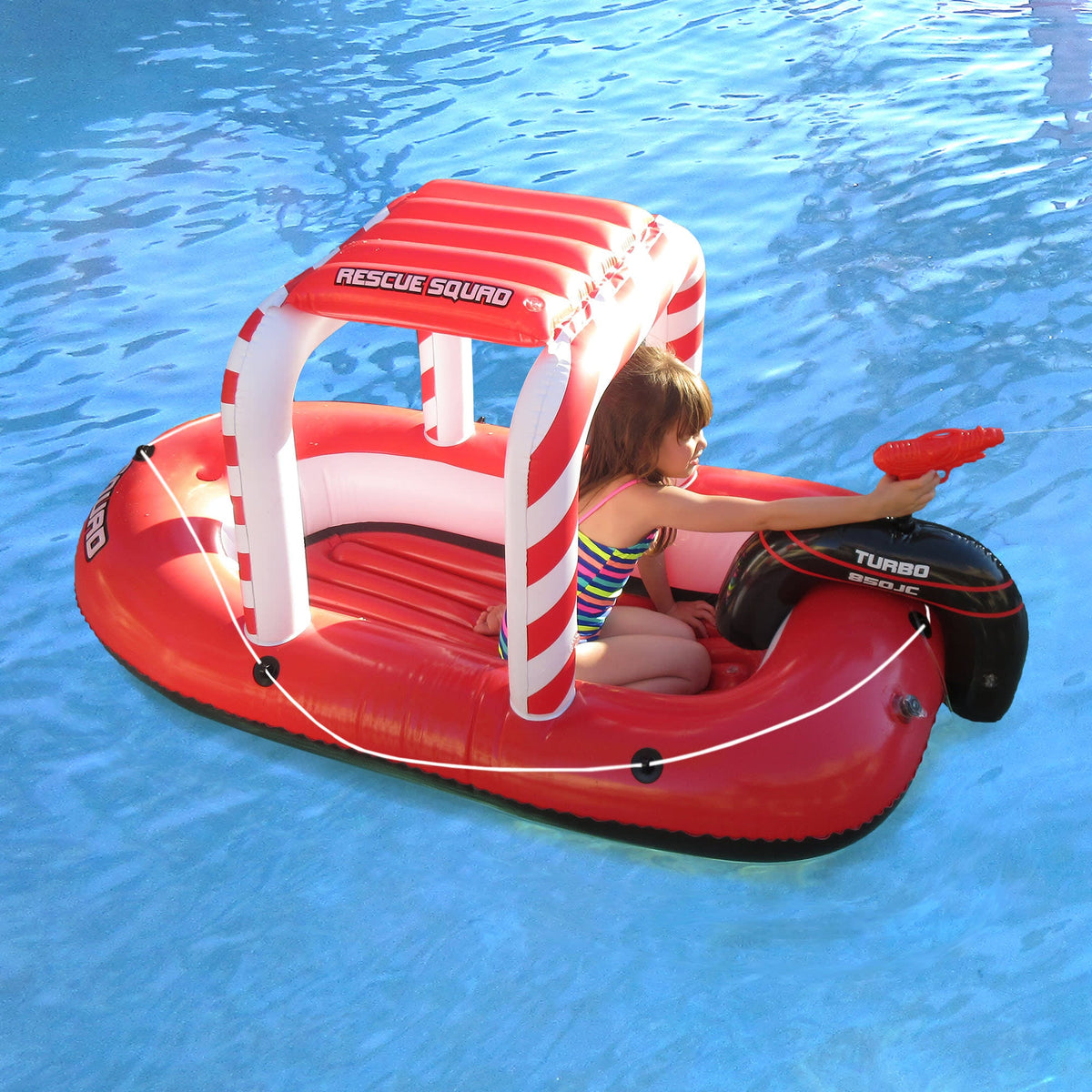 Blue Wave Rescue Squad Inflatable Boat - child seated under the canopy aiming the water squirter