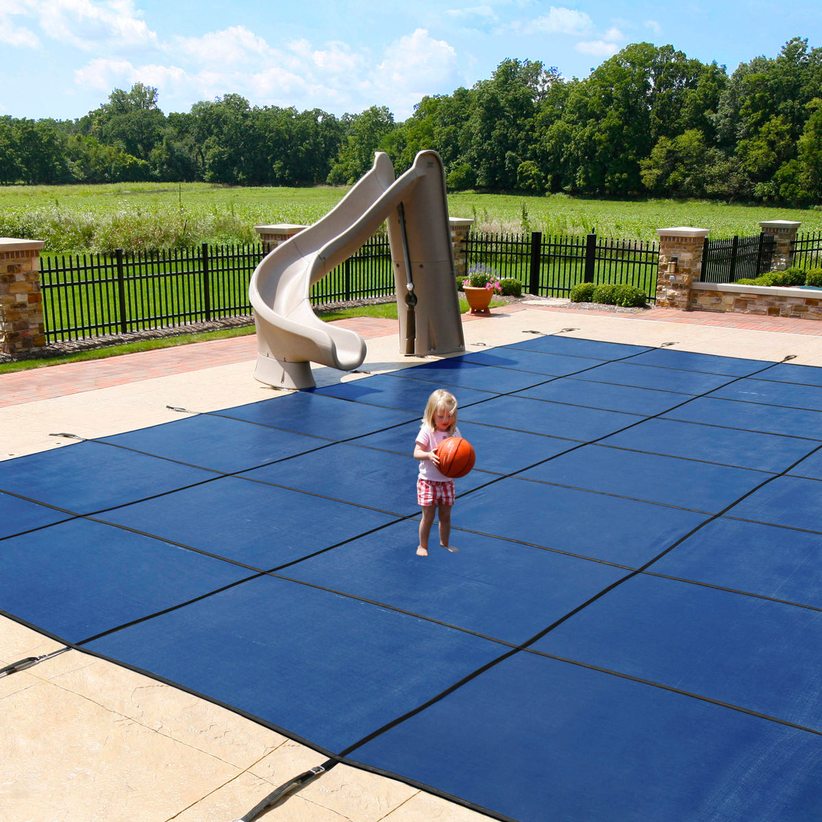 Arctic Armor 18-Year Mesh In-Ground Pool Safety Cover w/ Step Section - Tan Pool Cover — shown in use
