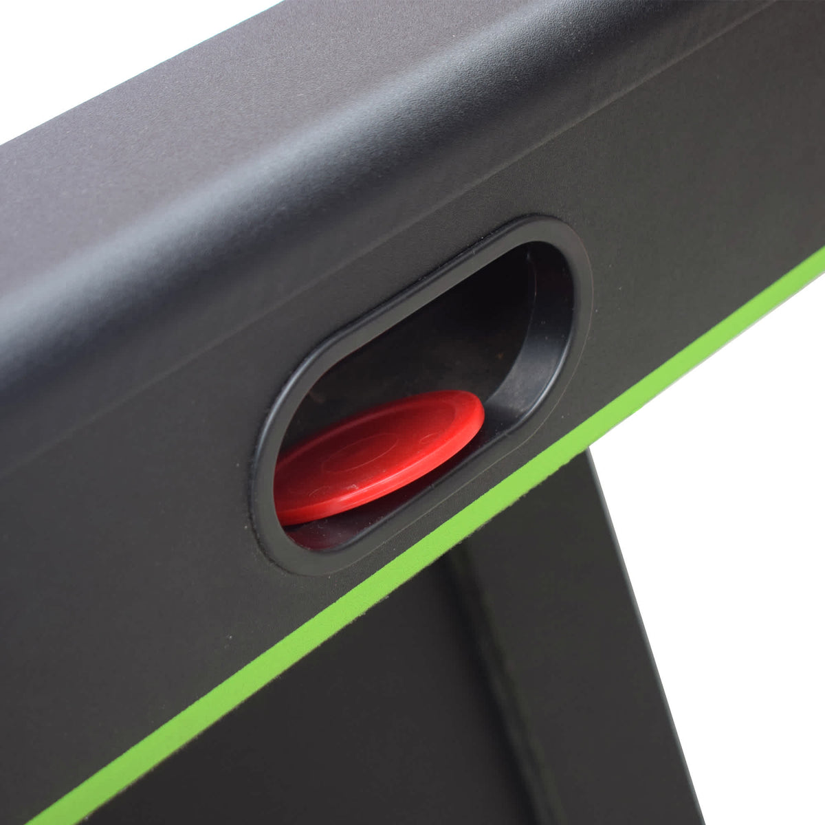 Hathaway Voyager Air Hockey Table - puck return slot in the black rail with a red puck inside