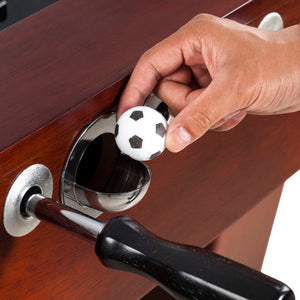Hathaway Millennium Foosball Table - hand dropping a ball into the chrome serve cup