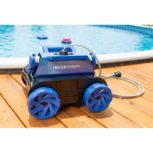 Blue Wave Indigo Hybrid x-5 Robotic Cleaner - unit on the deck beside an above-ground pool with its lead