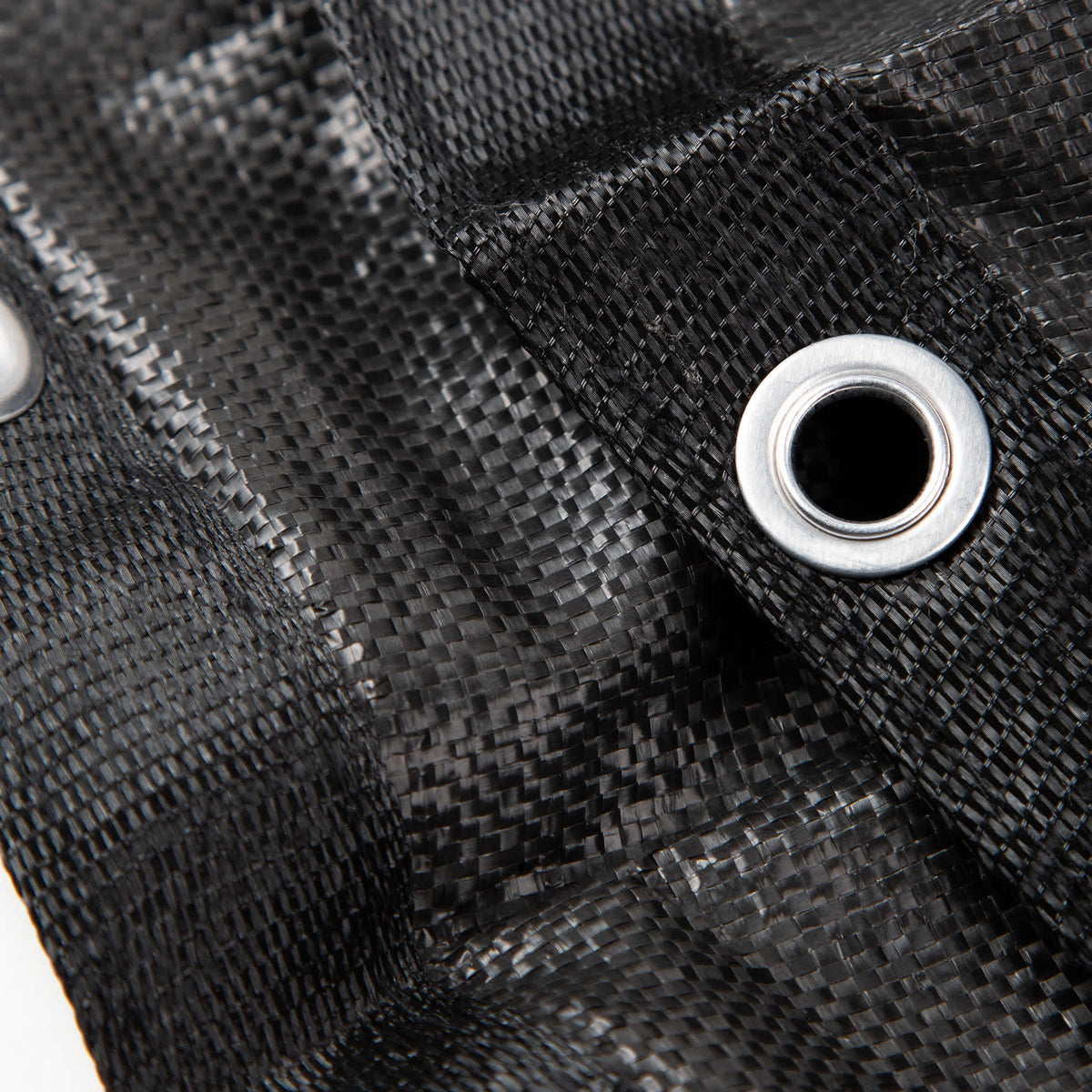 Arctic Armor Rugged Mesh In-Ground Winter Cover - woven mesh close-up with a steel grommet