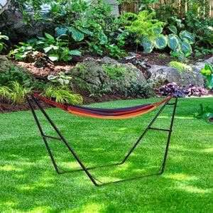 Island Retreat Tropical Hammock and Frame - striped hammock slung on its steel frame on a lawn
