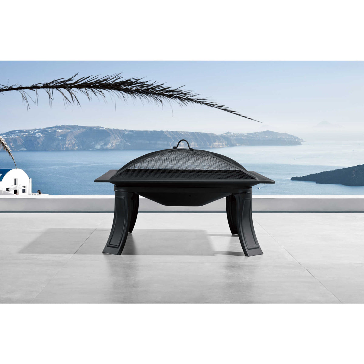 Island Retreat Riverside Fire Pit - pit with its mesh lid on a terrace above the sea