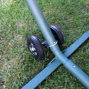 Island Umbrella Hammock Wheel Set - wheels clamped to a green hammock stand leg on grass