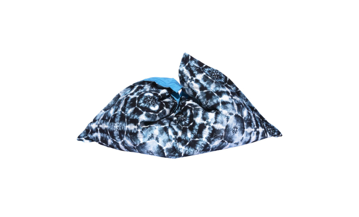 Ledge Lounger Laze pillow cover — shibori blue pattern shown on the float pillow