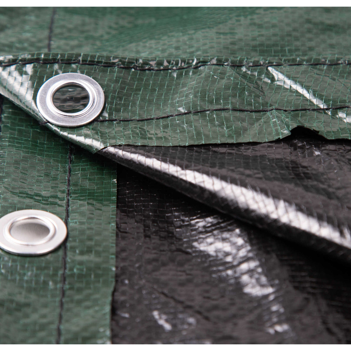 Arctic Armor 12-Year Above Ground Winter Cover - corner detail: reinforced grommets and green woven scrim