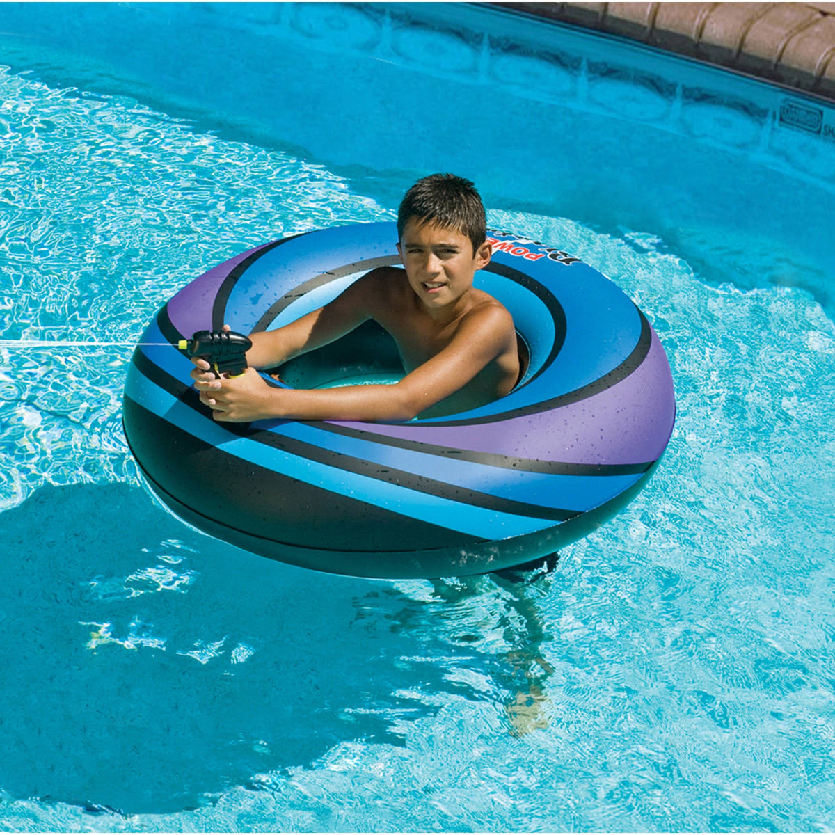 Swimline Powerblaster Squirter - child seated in the inflatable ring aiming the mounted water gun