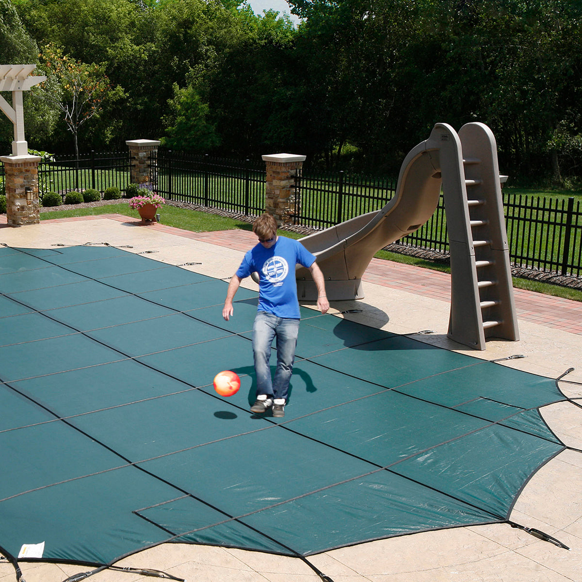 Arctic Armor 20-Year Super Mesh In-Ground Pool Safety Cover Pool Cleaner &amp; Maintenance — shown in use
