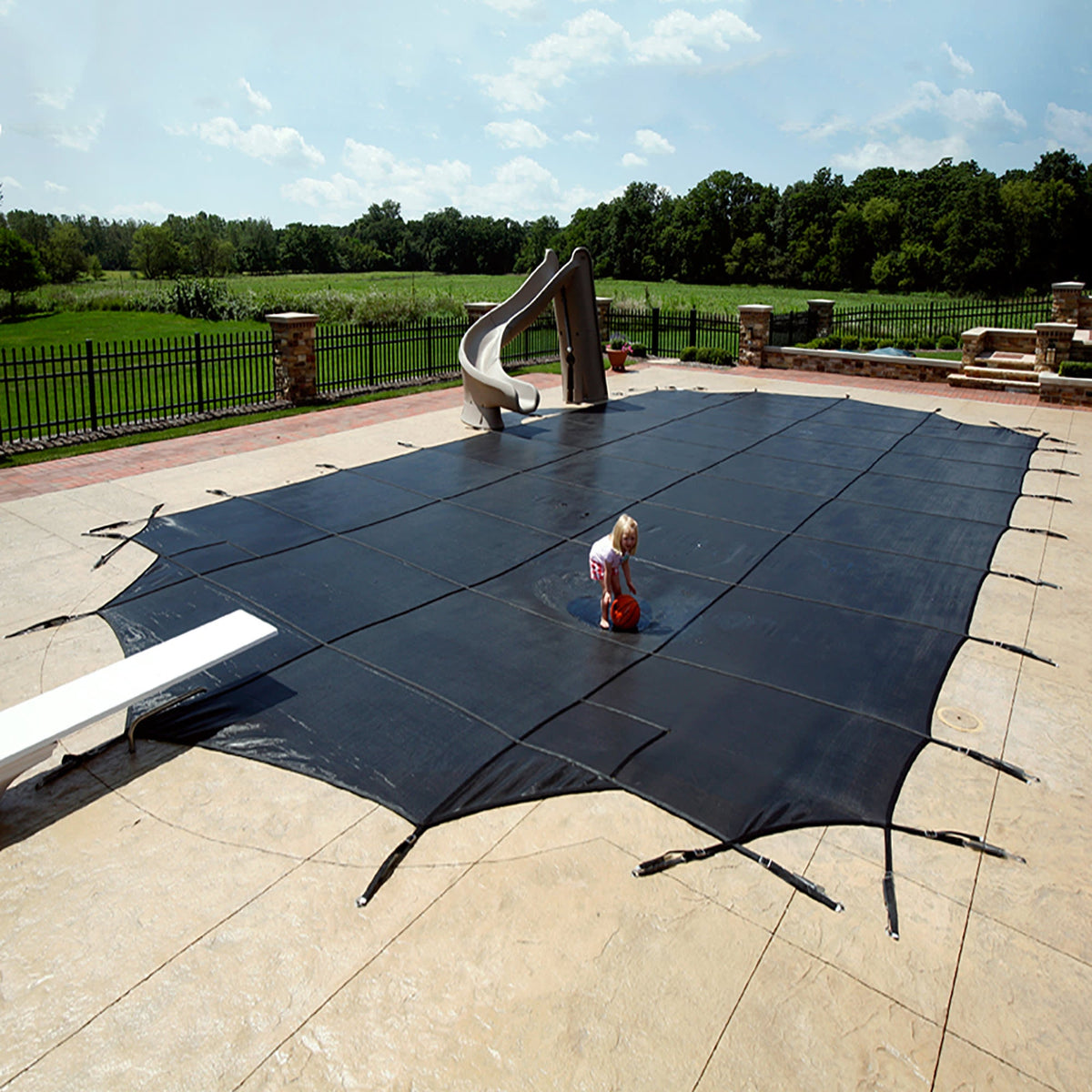 Arctic Armor 30-Year Premium Mesh In-Ground Pool Safety Cover w/ Step Section Pool Cover — shown in use
