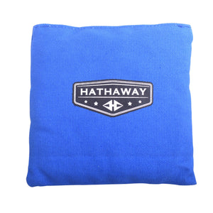 Hathaway Regulation Cornhole Bag Set - single blue bag showing the woven face and badge