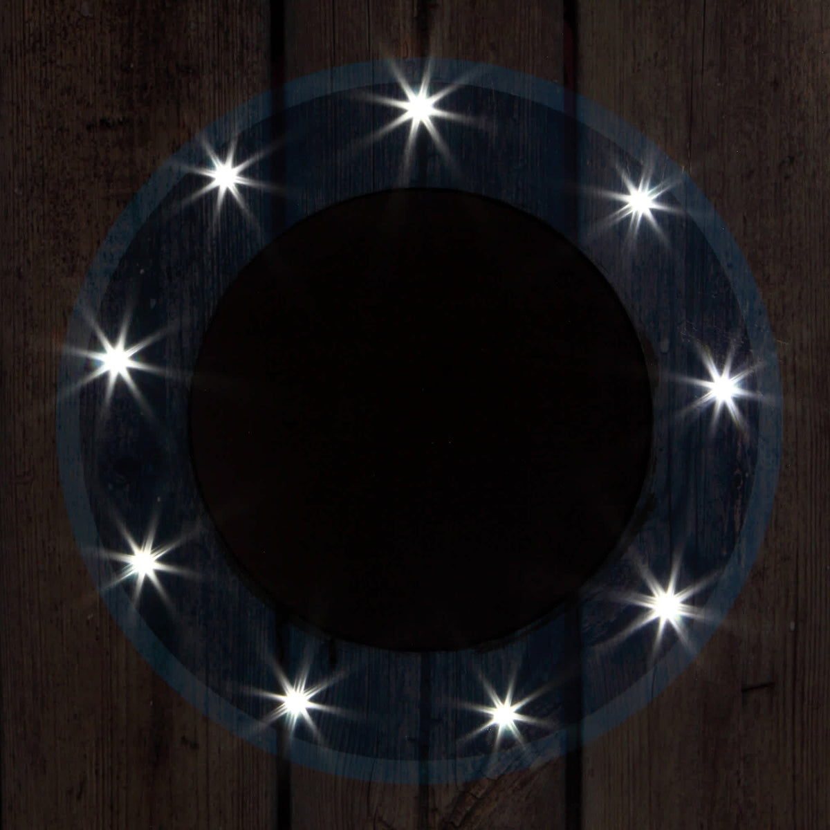 Hathaway Atlantic LED Cornhole Set - target hole LEDs glowing against the board after dark