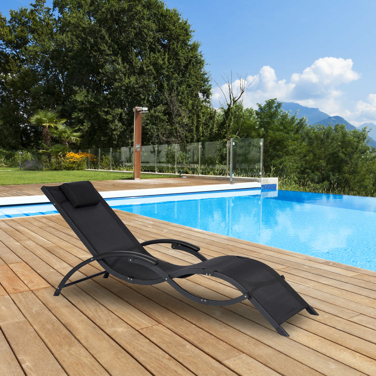 Island Retreat Sea Breeze Foldaway Lounger - black lounger on a timber deck beside a pool
