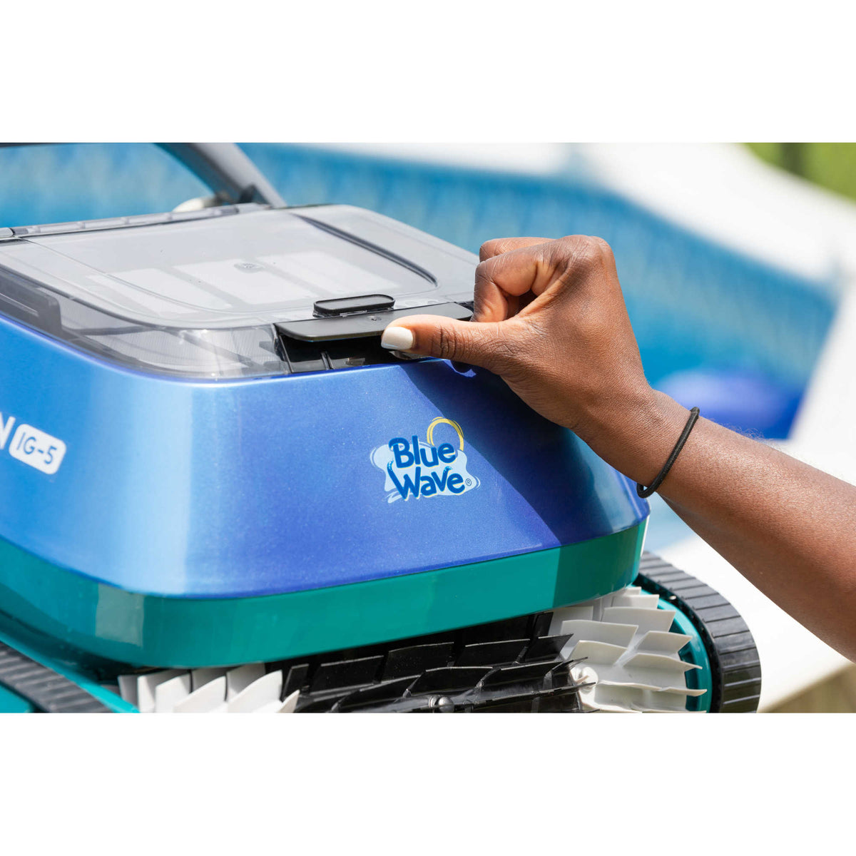 Blue Wave Meridian IG-5 Robotic Cleaner - top-loading filter lid being opened by hand
