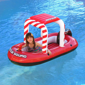 Blue Wave Rescue Squad Inflatable Boat - child in the boat seen from the bow with the striped canopy