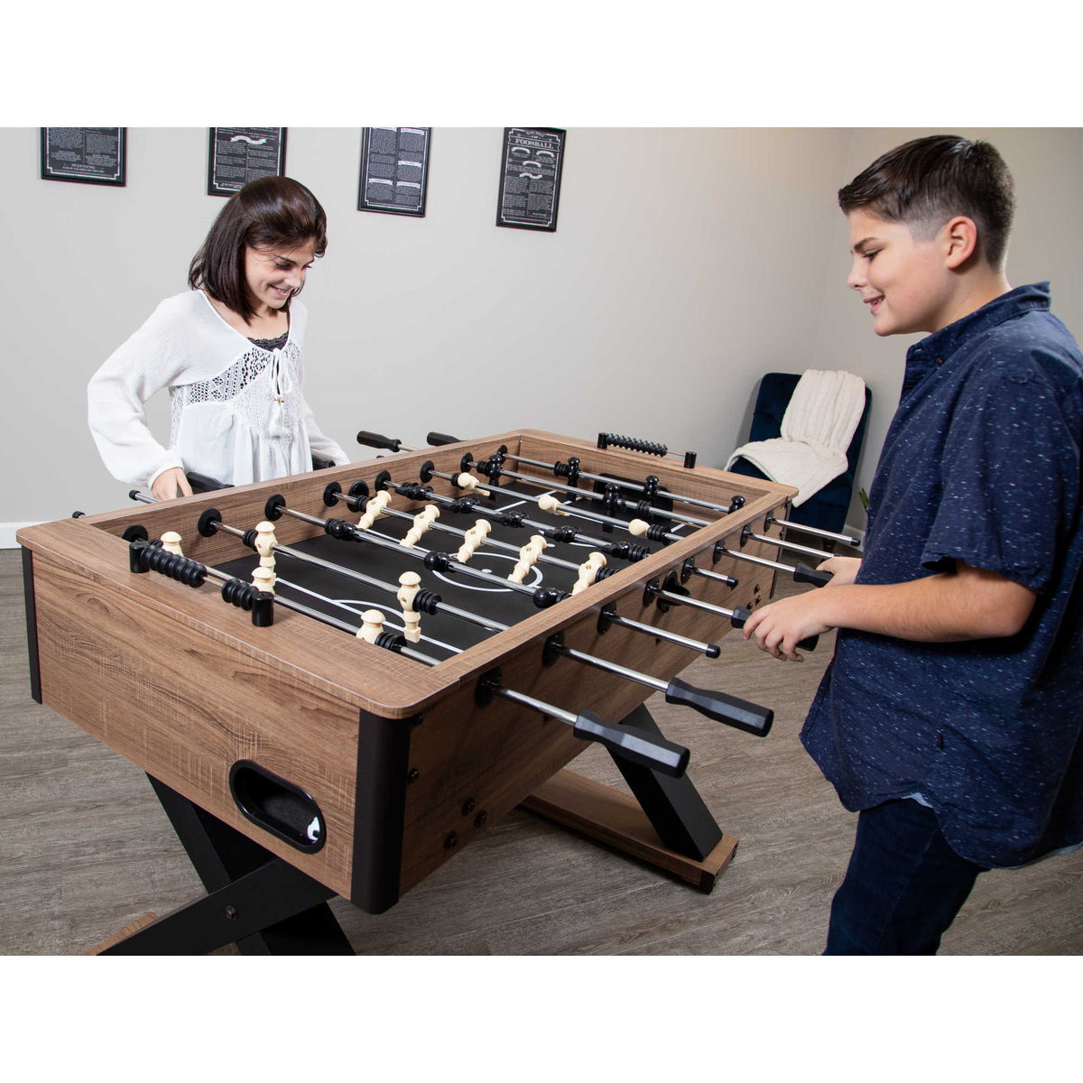 Hathaway Excalibur Foosball Table - two players at the table working the rods