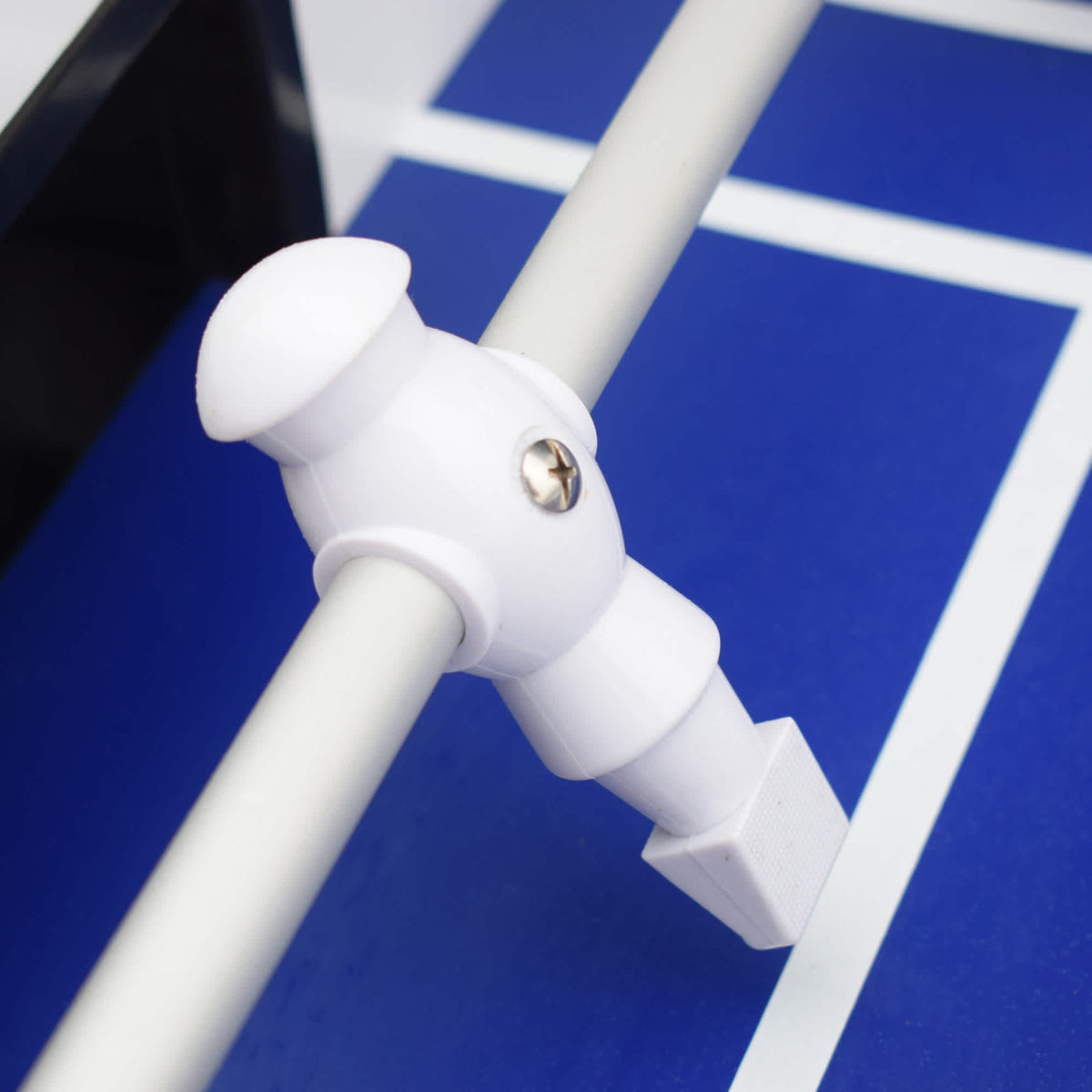 Hathaway Highlander Outdoor Foosball Table - white player figure on its rod above the blue pitch