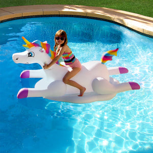 Blue Wave Cloud Rider Rainbow Unicorn Pool Float - child on the float, seen from the opposite side