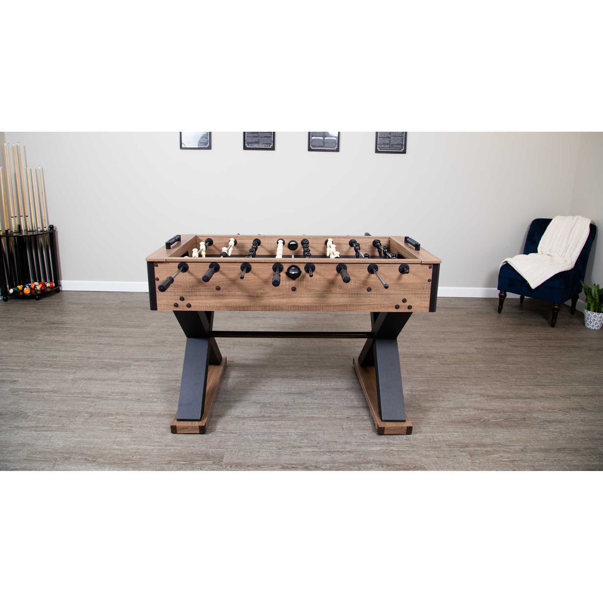 Hathaway Excalibur Foosball Table - table set up in a games room beside a cue rack