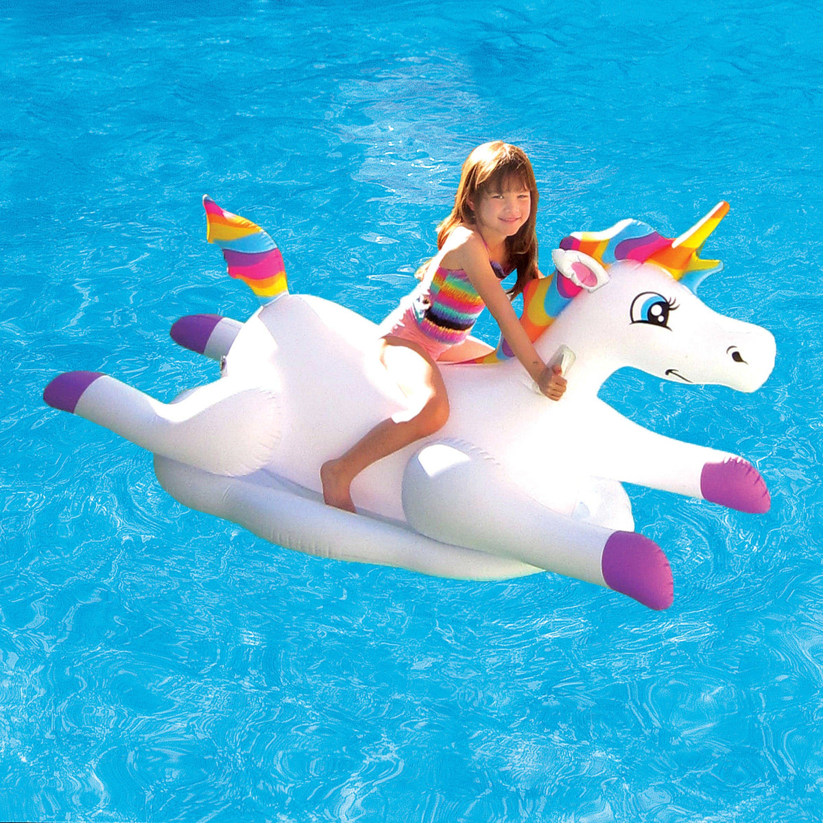 Blue Wave Cloud Rider Rainbow Unicorn Pool Float - child riding the unicorn float across a pool