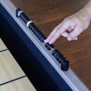 Hathaway Montecito Shuffleboard - hand sliding a bead along the wooden abacus scorer