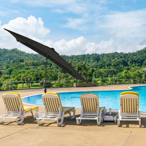Island Umbrella Nassau Rectangular Umbrella - black canopy tilted over poolside loungers
